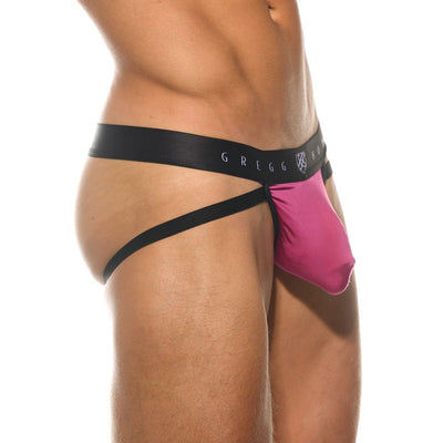 Close side profile of the magenta Room Max jockstrap highlighting the pouch depth
