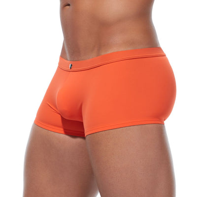 Close side profile of the orange Caliente swim shorts highlighting the comfortable leg fit