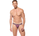 Front view of a model wearing the red Outline thong