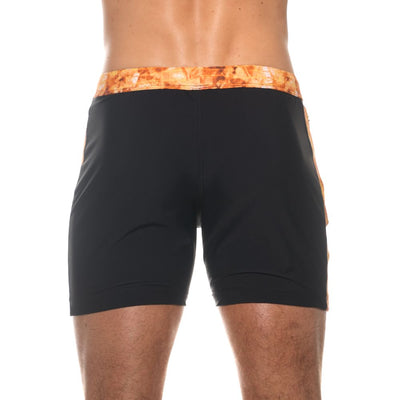 Detailed back view of black Abyss swim trunks showing the fabric texture